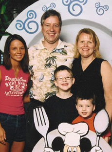 Social Security Disability Lawyer Greg Marks, his wife, and three children; Marks specializes in Social Security disability claims and appeals, ensuring that people who have been injured or otherwise incapacitated receive benefits including back pay.